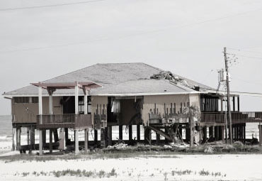 wind damage - spray foam can help prevent uplift to Pomona roofs